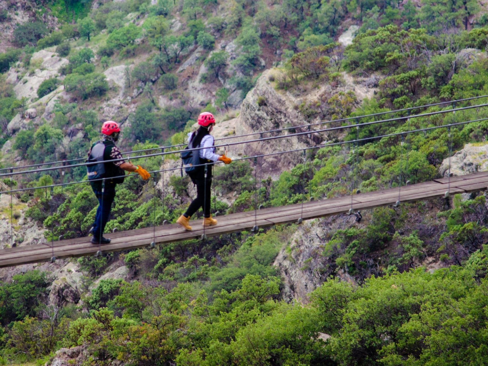 a man walking up a hill