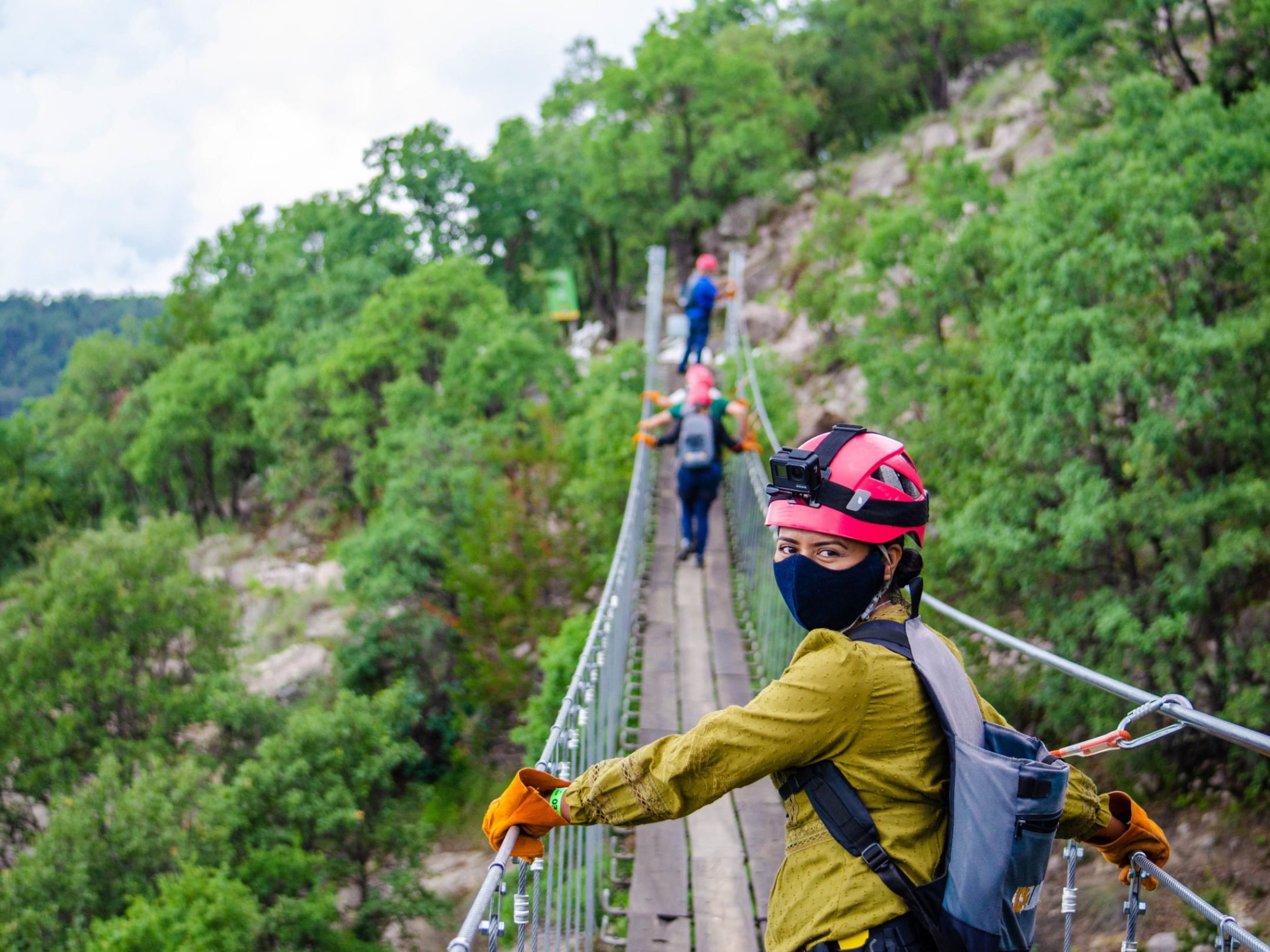 a man riding on top of a hill