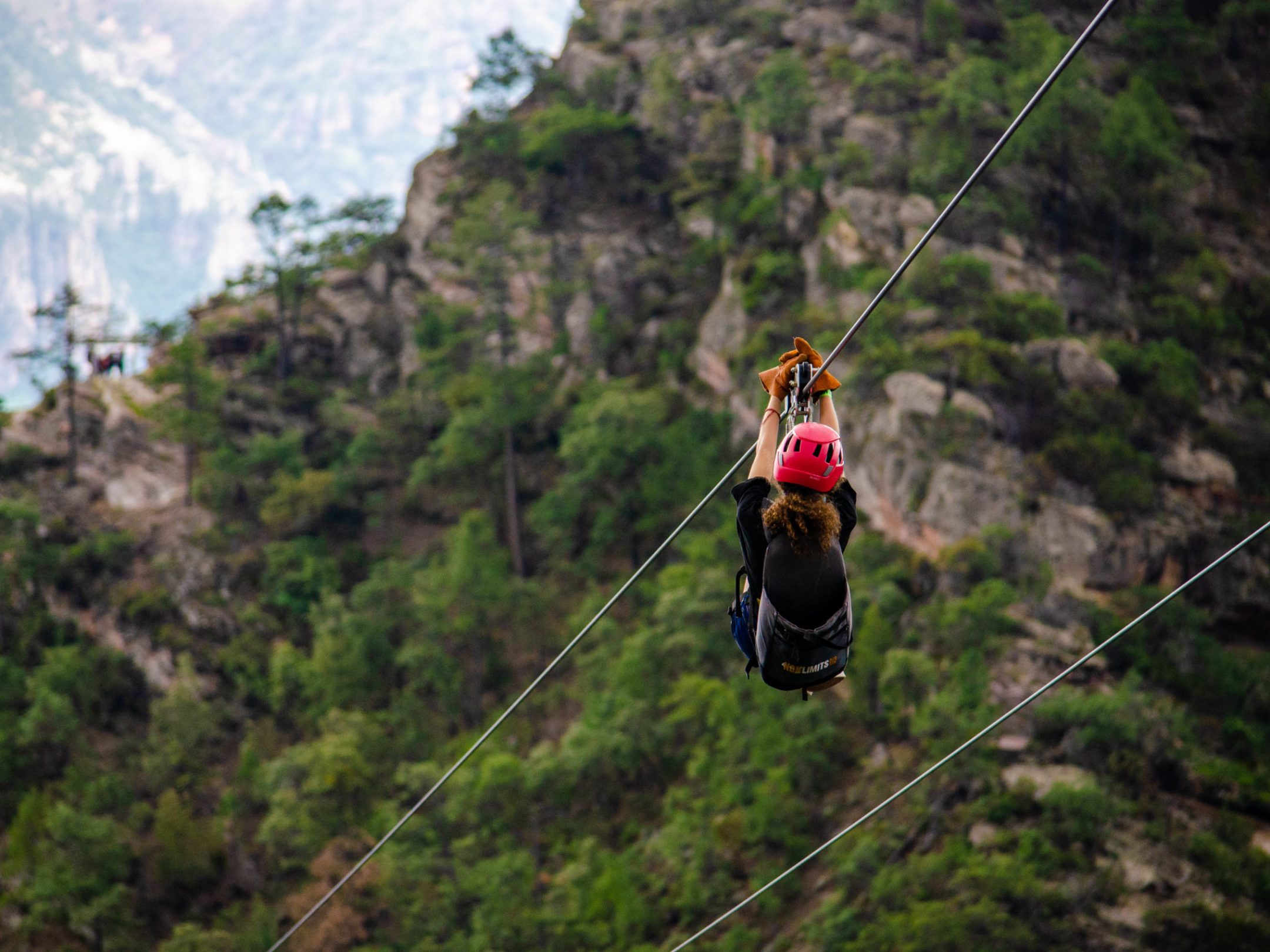 a pole with a mountain in the background