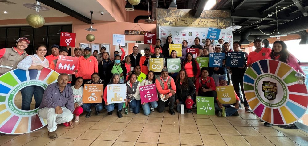 a group of people posing for the camera