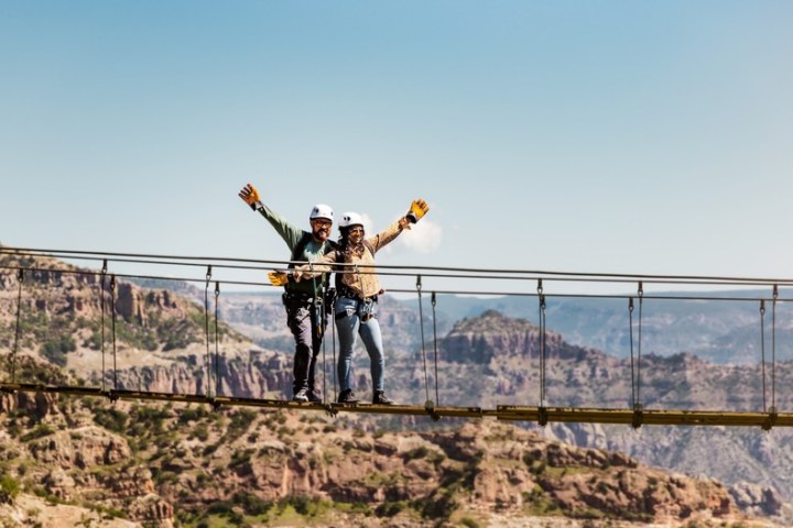 a man standing on a bridge